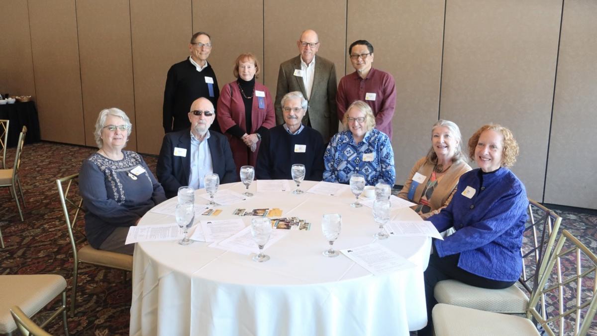 UMRA President Ron Matross and Treasurer Kristy Frost-Griep, pictured left standing, welcomed newcomers to the UMRA luncheon forum at Midland Hills in March 2023.